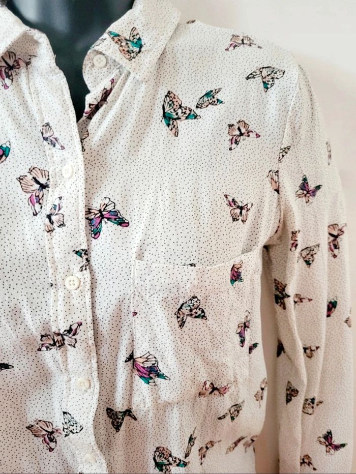 Chemisier chemise coton blanche
papillon multicolores Zara taille
XS 34 - photo numéro 3