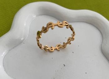 Bague mixte dollars en acier inoxydable doré 21 mm