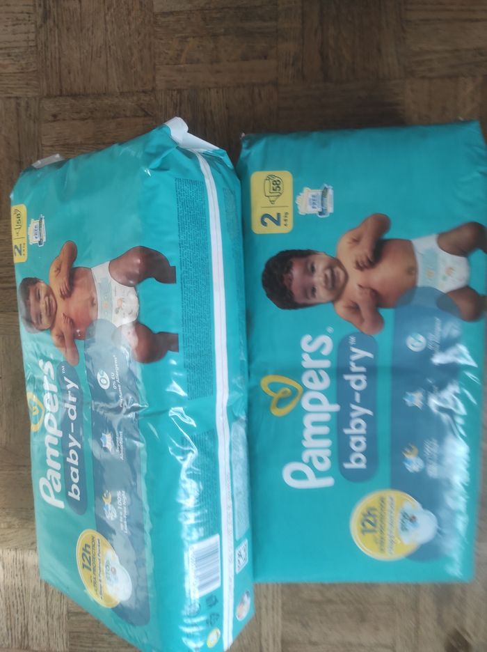 Lot 2 paquets Pampers taille 2 neufs - photo numéro 2