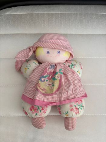 Peluche poupée Corolle rose fleurie