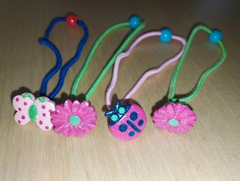 Lot de 4 élastiques cheveux motif printemps