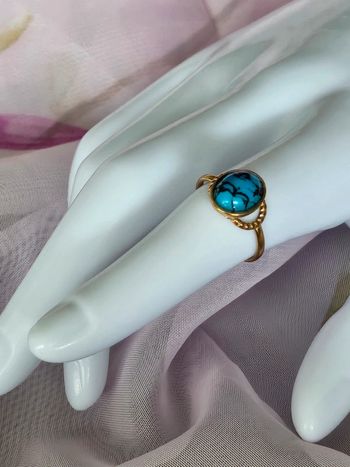 Bague avec avec sa pierre turquoise mélangée en acier inoxydable