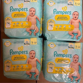 4 paquets de couche taille 1