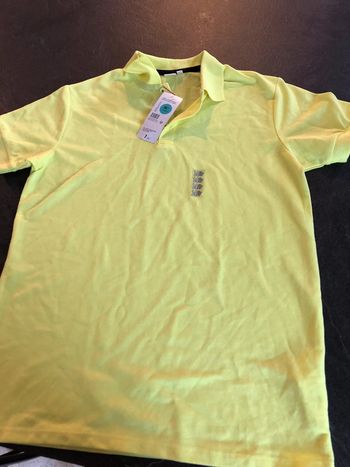 Polo 14 ans jaune fluo neuf