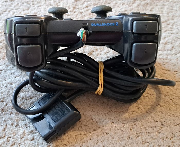 🎮 Manette officielle DualShock 2 noire Sony PlayStation 2 PS2 - photo numéro 3