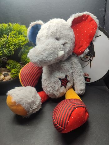 Doudou éléphant gris rouge jaune bleu étoile tape à l'oeil tao peluche Rayé Pois