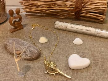 Collier offert pendentif coquillage