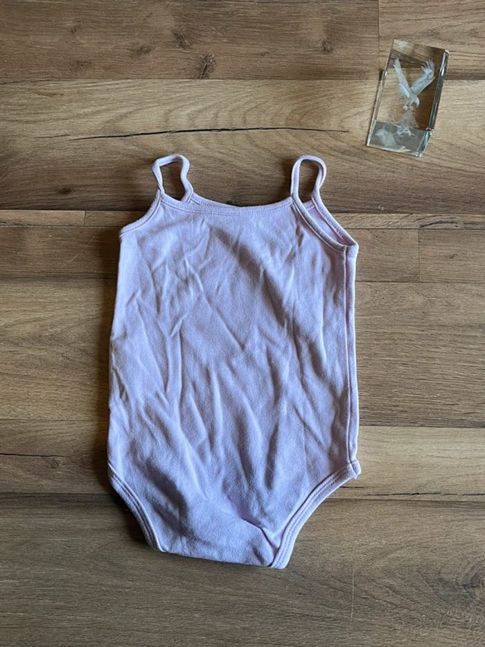 Je vend un débardeur manche courte fille 12 mois très bon état - photo numéro 2