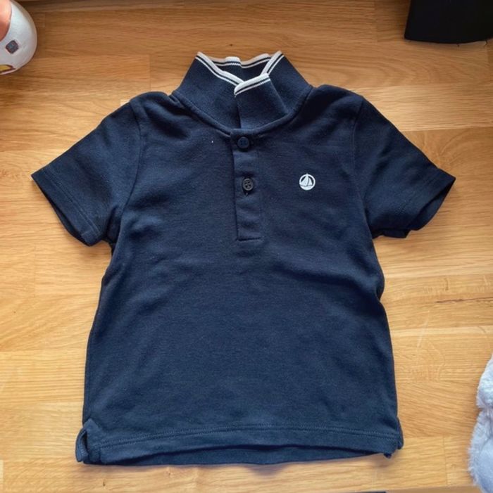 Polo bébé en très bon état petit bateau