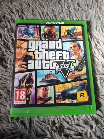 Boîte vide de jeu avec livret et poster GTA 5