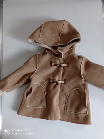 veste en peau retournée Zara 9/12 mois