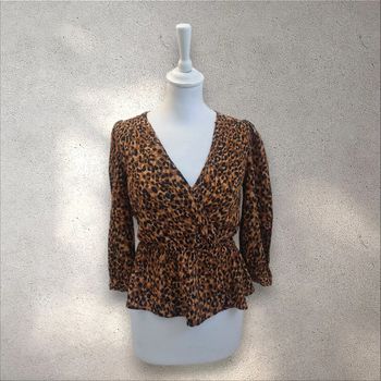 Top peplum léger et fluide imprimé léopard taille xs 34