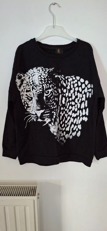 Sweat léopard noir et blanc