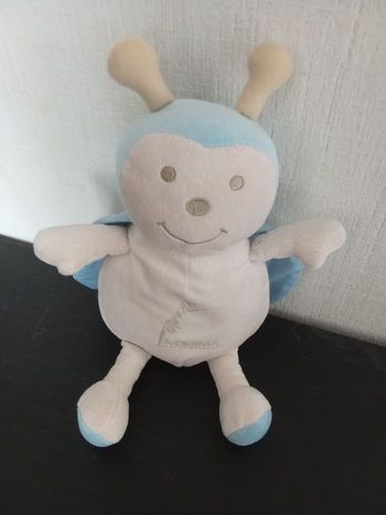 Gros doudou, peluche  coccinelle bleu ciel, beige  marque  aderma
