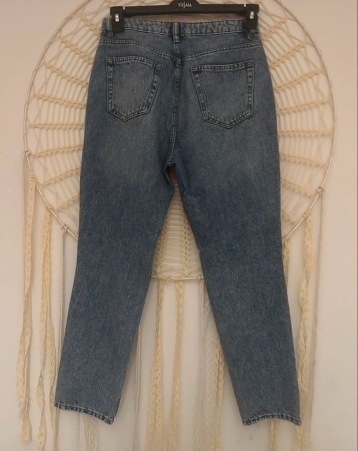 Jeans à trou - photo numéro 3