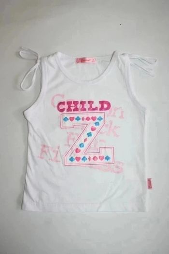 Débardeur blanc taille 2 ans