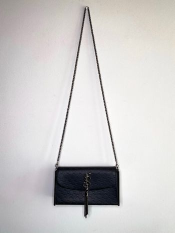 Sac pochette en cuir noir 