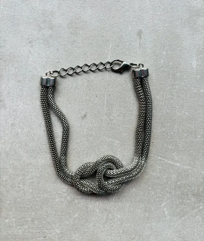 Bracelet argenté mailles effet noeud