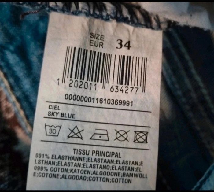Jeans effet délavé avec troués taille 34 - photo numéro 9