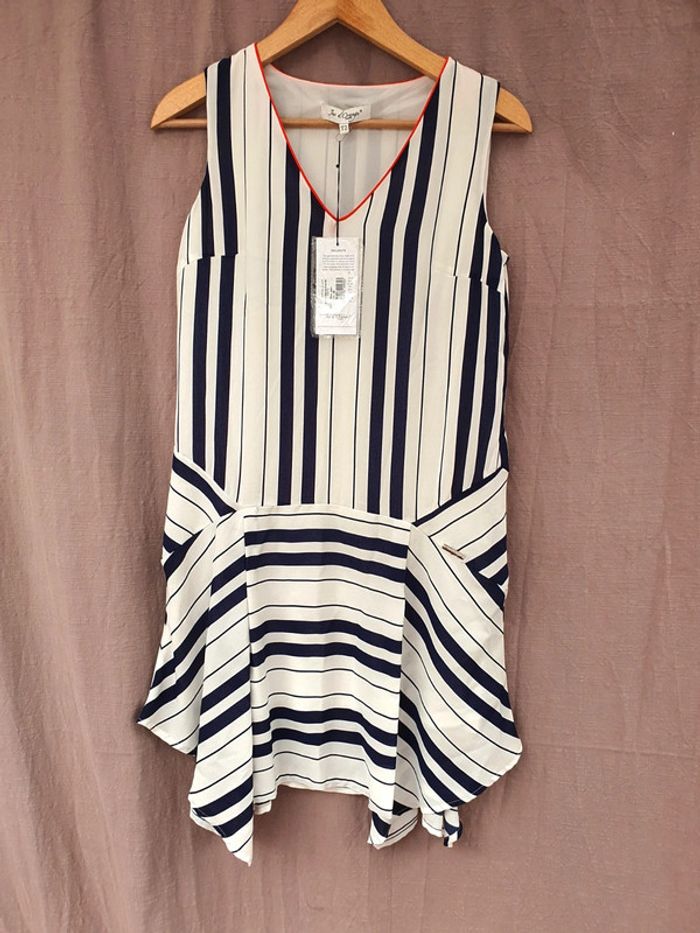 Robe Neuve 40. Jus d'orange.