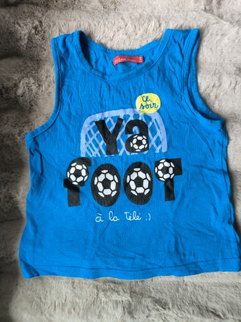 Débardeur bleu Tissaia garçon 6 ans très bon état