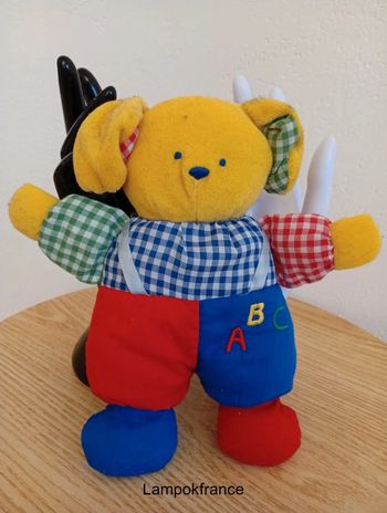 Doudou hochet chien multicolore simpson