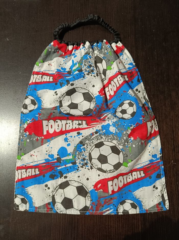 Grand bavoir garçon , motif football , doublé nid d'abeille