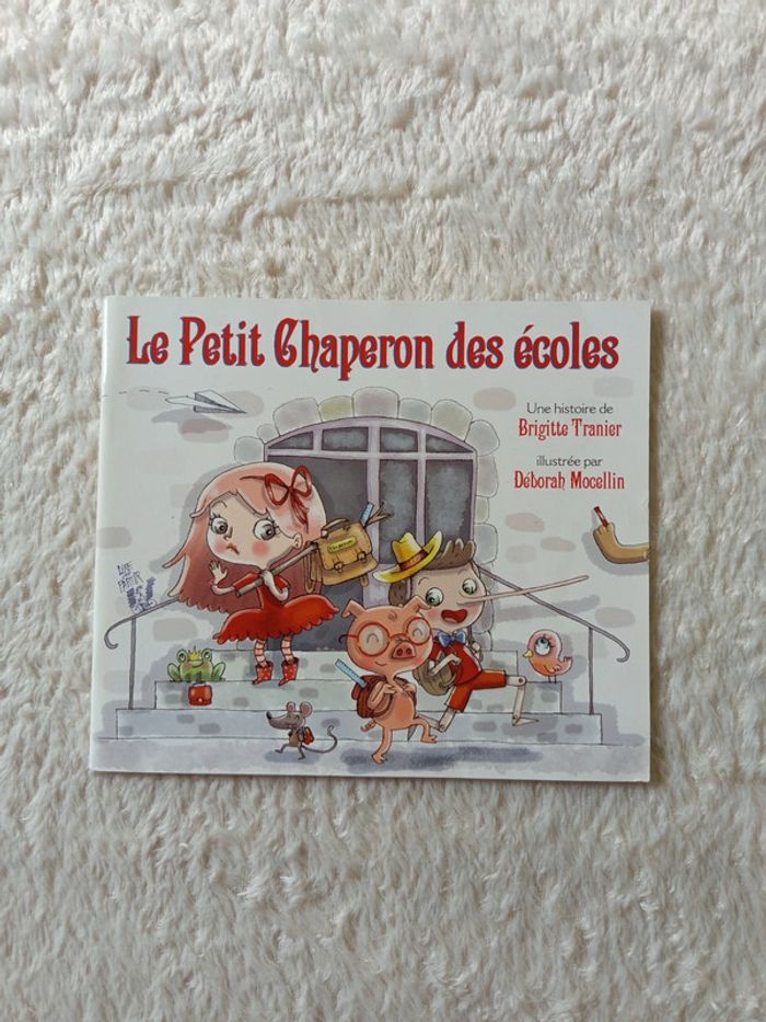 Livre Le petit chaperon des écoles