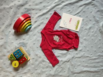 body manches longues rose fuchsia ouverture devant gémo 1 mois