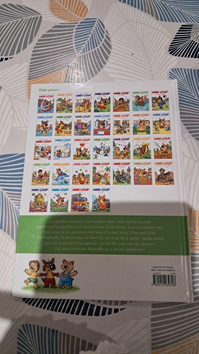 Livre mini loup en vacances - photo numéro 2