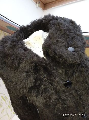 Manteau fausse fourrure