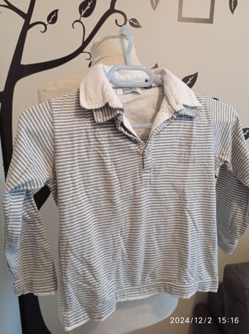 Polo de chez okaidi taille 8 ans réf R243 P11