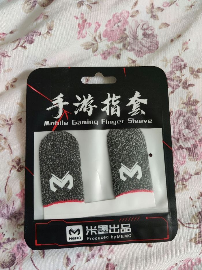 Mobile gaming finger sleeve
