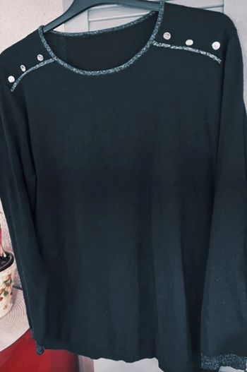 Pull noir avec bordures argentées