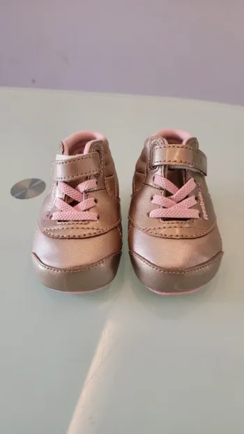 Baskets dorées montantes scratch et lacets