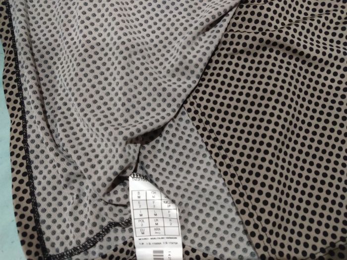 Jupe courte porte feuille à pois noirs - photo numéro 5