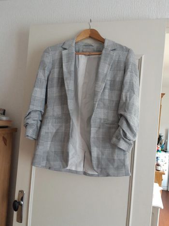 Veste à carreaux H et M
