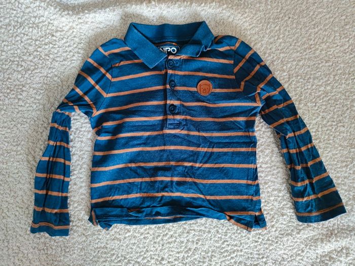 Polo manches longues rayé bleu T.24 mois