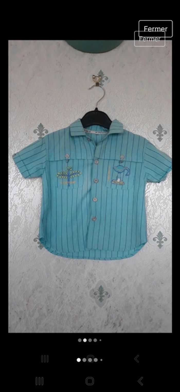 Boy chemisette bleue 24 mois