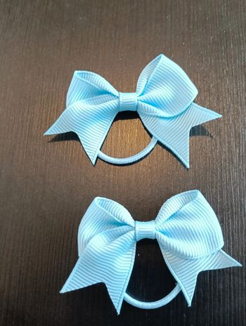 Élastique nœud papillon neuf bleu clair