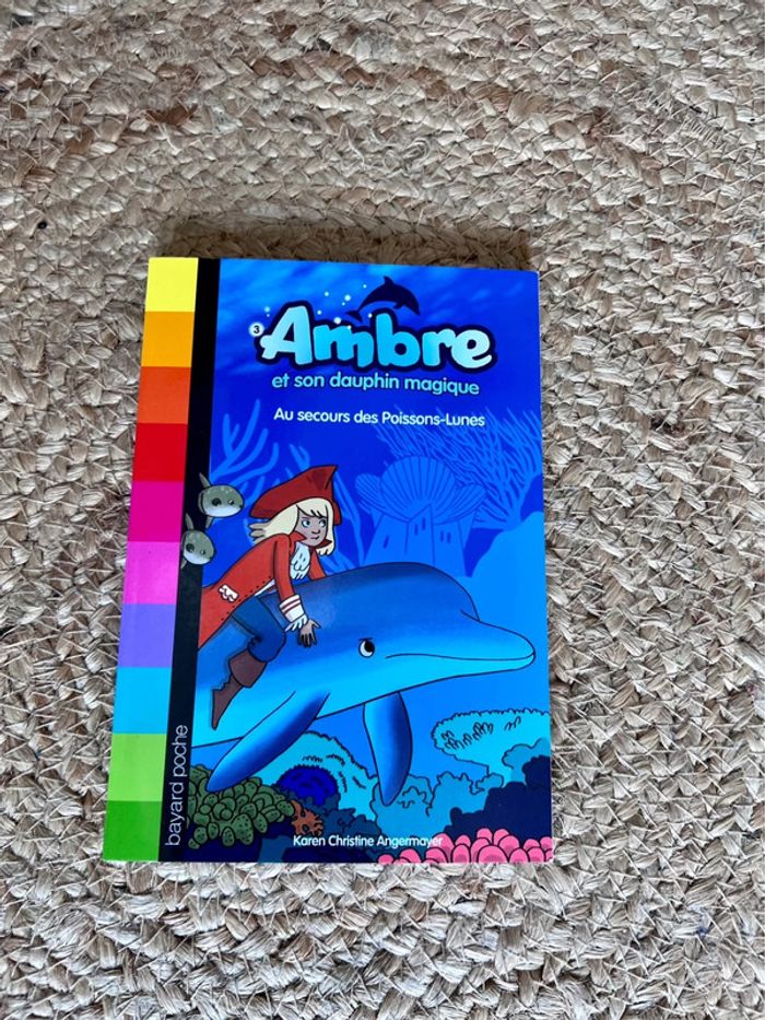 Livre Ambre et son dauphin magique , au secours des poissons lune - photo numéro 2