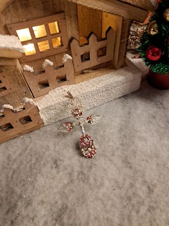 Croix argenté avec strass rose et blanc