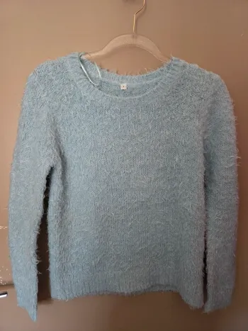 Pull poils doux bleu 12 ans