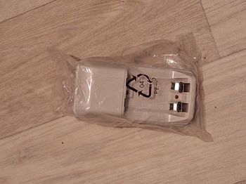 Chargeur de piles rechargeables LR06 (AA) - NEUF