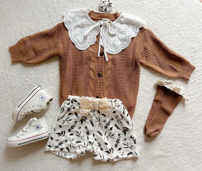 Ensemble short créatrice noeud et gilet 7 ans neuf