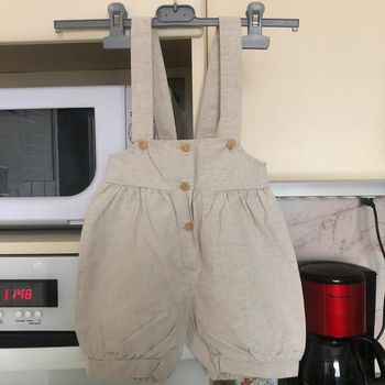 Pantalon à bretelles