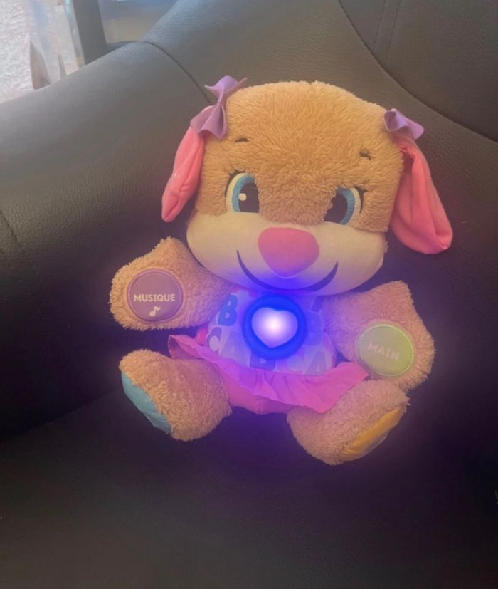 Peluche musical sœur de puppy