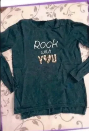 Pull  TAO  8  ans  bon  état
