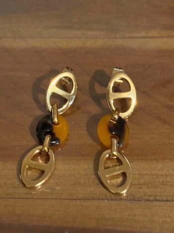 Boucle d’oreilles maillons farandole acier inoxydable or et résine léopard neuve