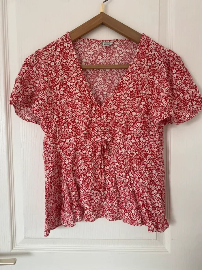 Top peplum fleuris